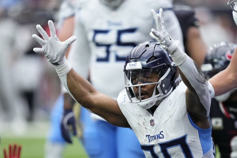 Tennessee Titans running back Tony Pollard celebrates a touchdown against the Houston Texans on Sunday at NRG Stadium in Houston. Photo by Kevin M. Cox/UPI